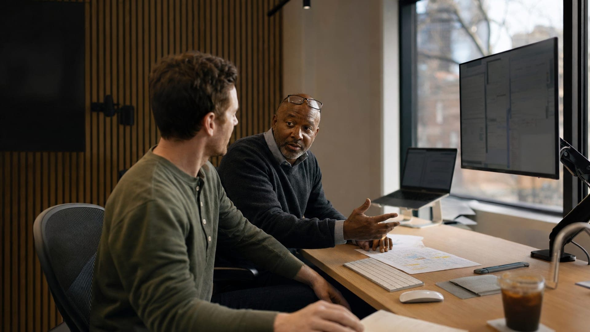 The two lanes meeting at one desk