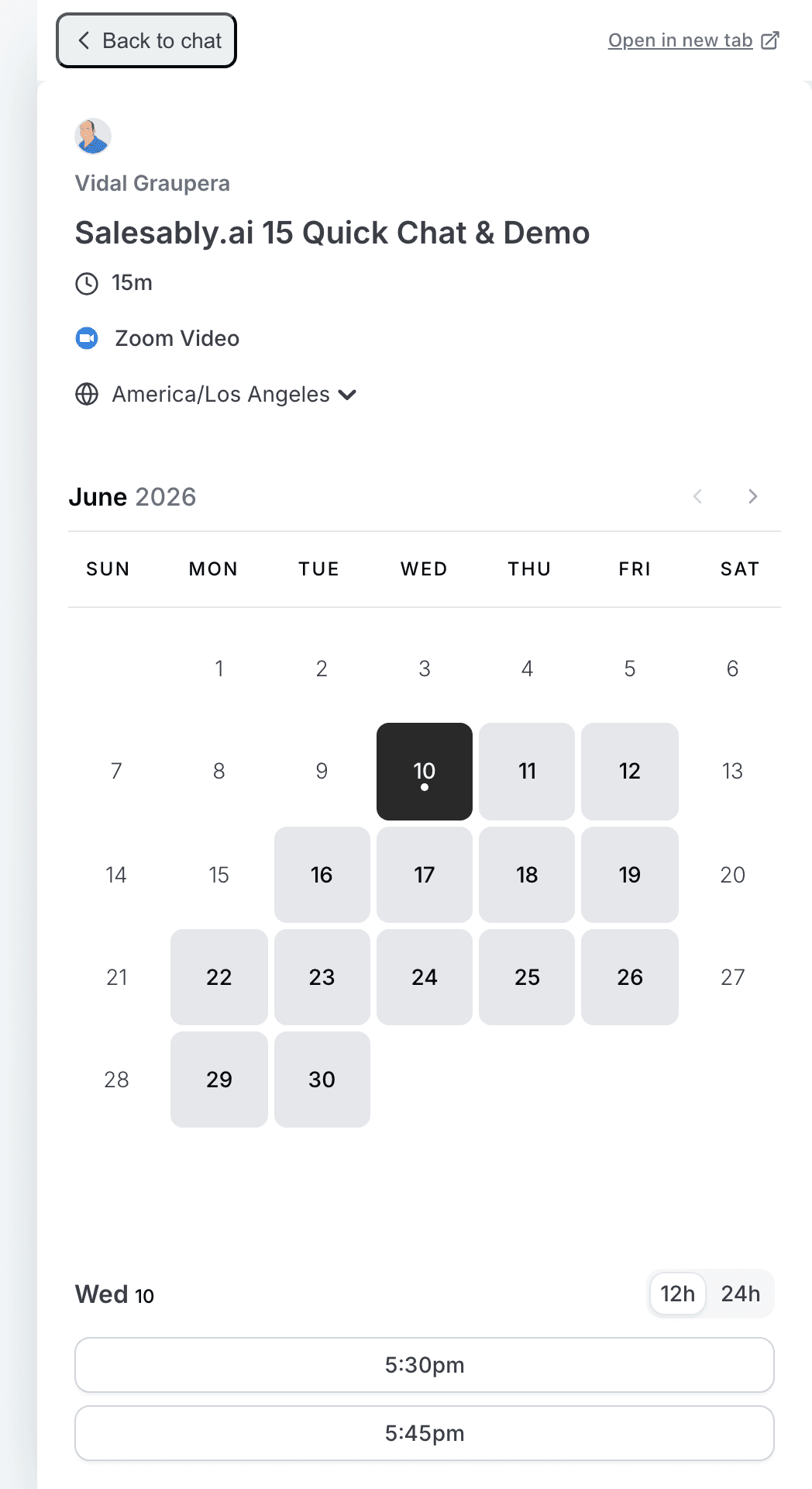 A Cal.com calendar open inside the chat panel for booking a meeting without leaving the conversation